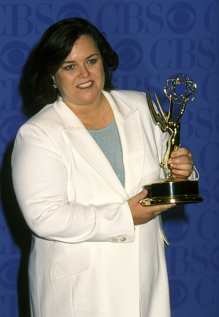 Rosie O&#x27;Donnell holding an Emmy