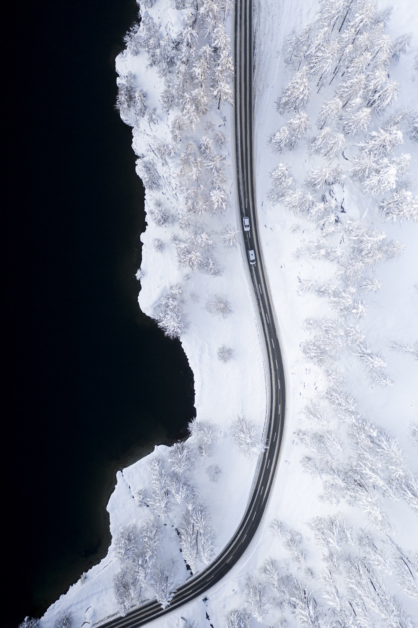 Aerial view of snow-cleared road