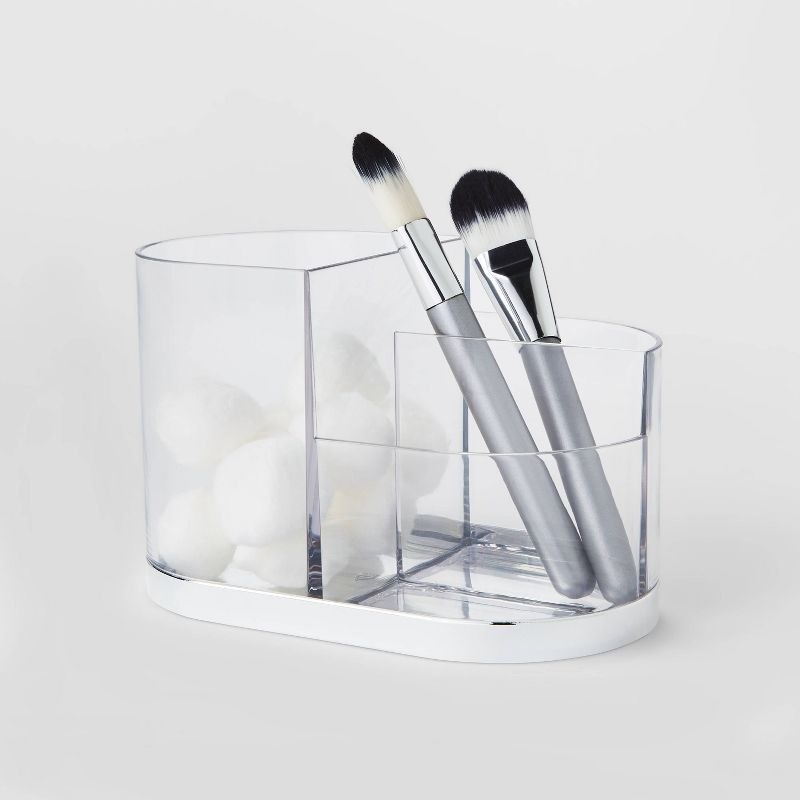 the silver and clear vanity tray with brushes and cotton balls