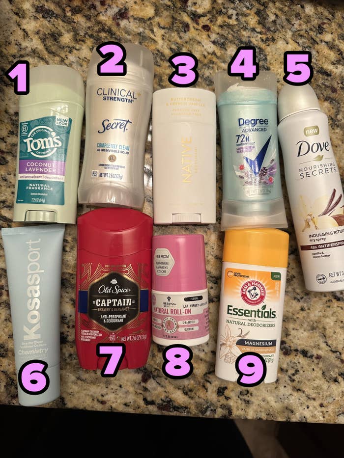 nine of the deodorants on a table