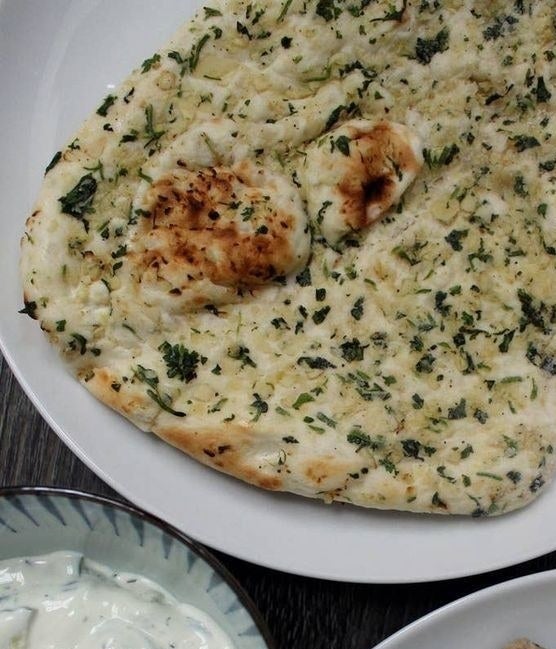 Garlic naan with tzatziki.