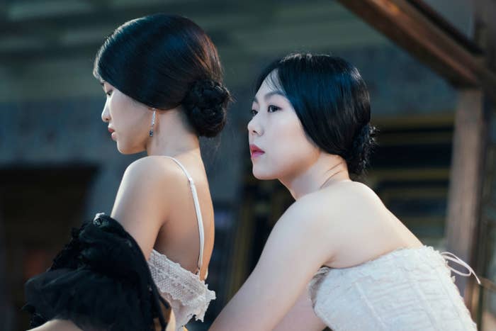Kim Tae-ri and Kim Min-hee as two women in Japan-occupied Korea, dressed in period-era lingerie
