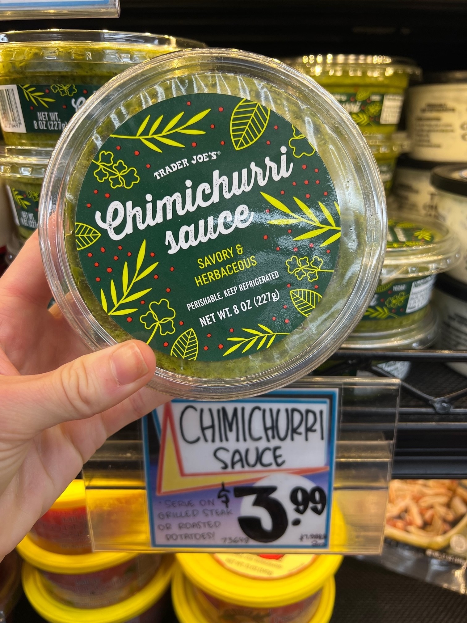 A container of Chimichurri Sauce.
