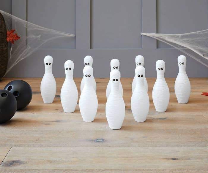 the mummy wrapped bowling pins with cute eyes