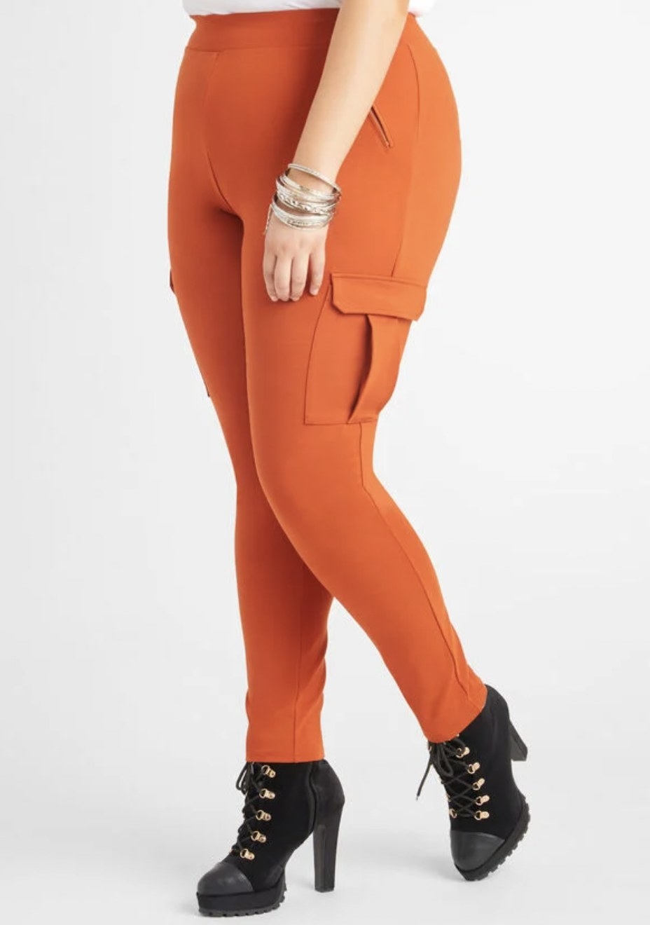 The orange leggings showing flap-top cargo pocket on side