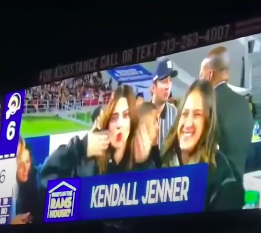 A blurry Kendall on the Jumbotron