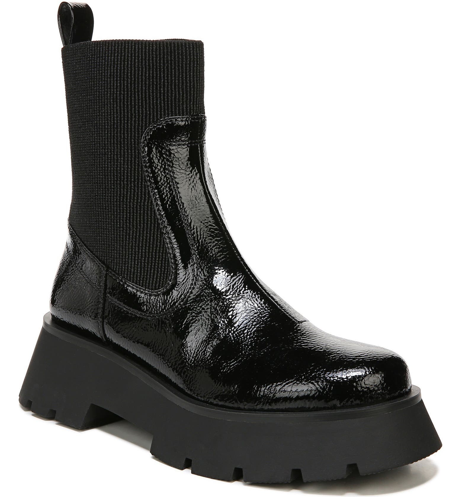 A close up of the boot with glassy faux leather, a stretchy ankle, and chunky sole