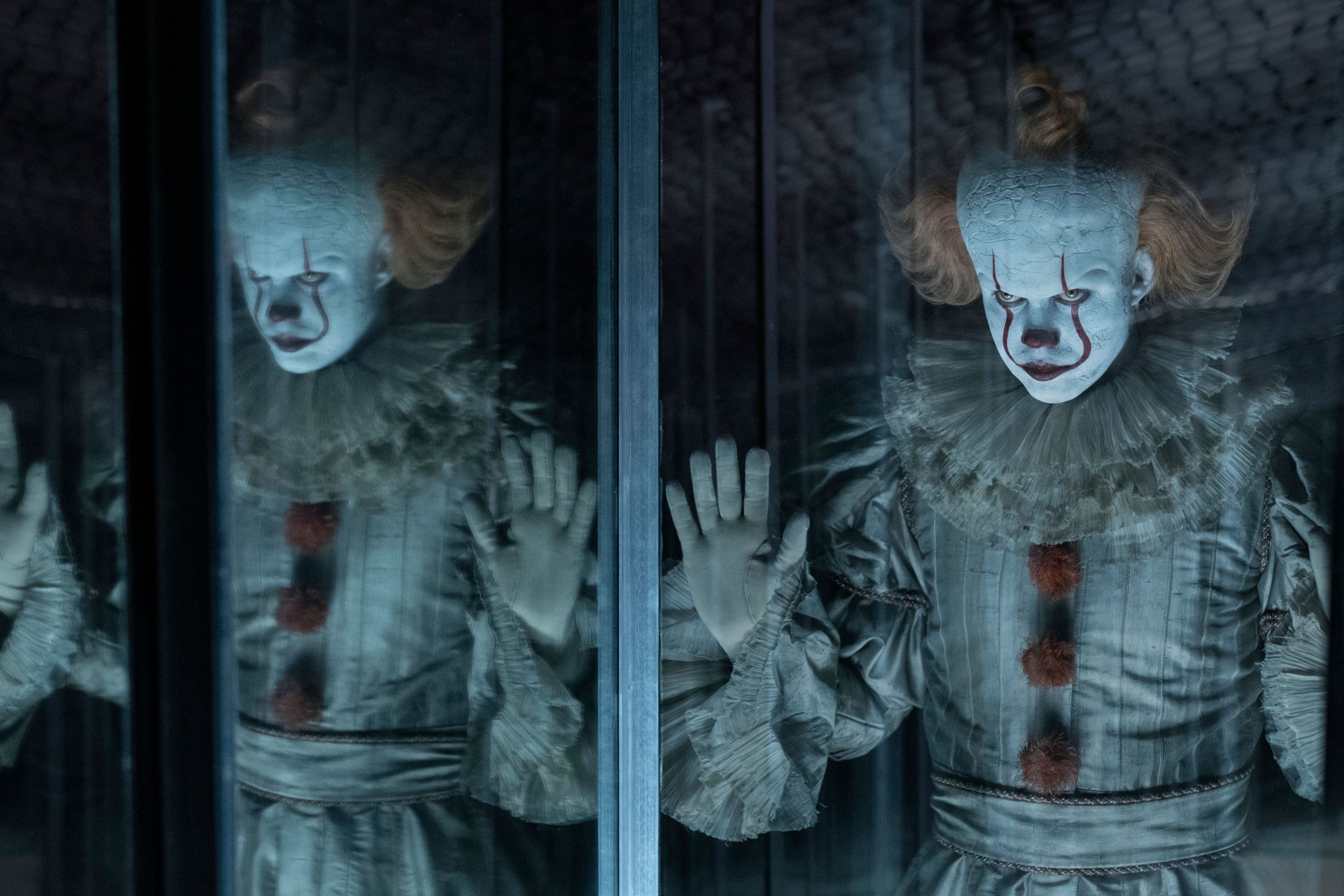 Pennywise against a glass
