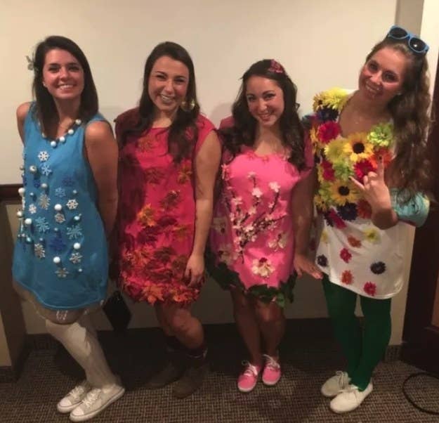 four girls dressed as each of the seasons, fall, winter, summer, and spring