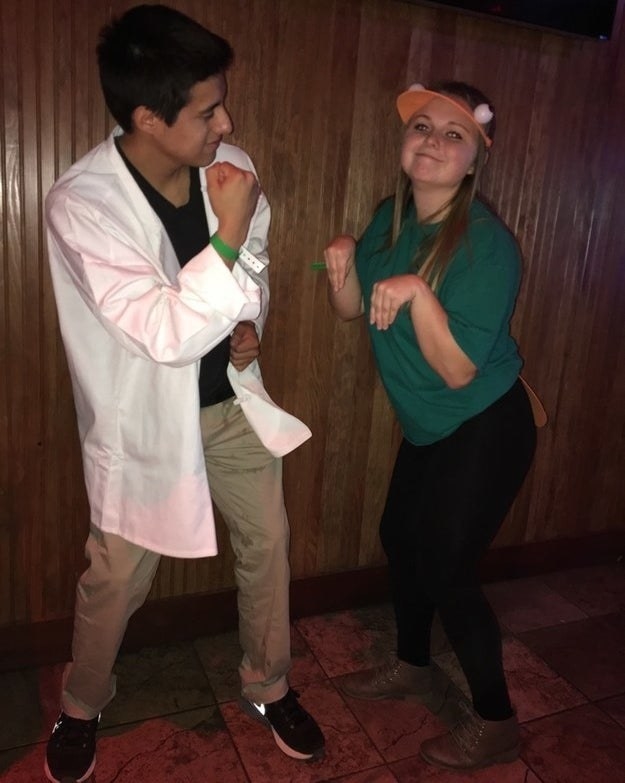 A couple dressed as Dr. Doofenshmirtz &amp;amp; Perry the Platypus from Phineas and Ferb