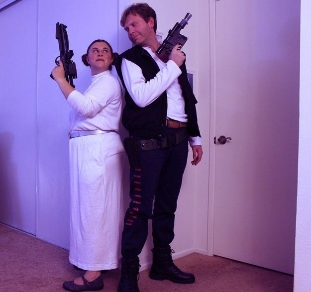 A couple dressed like Princess Leia and Han Solo