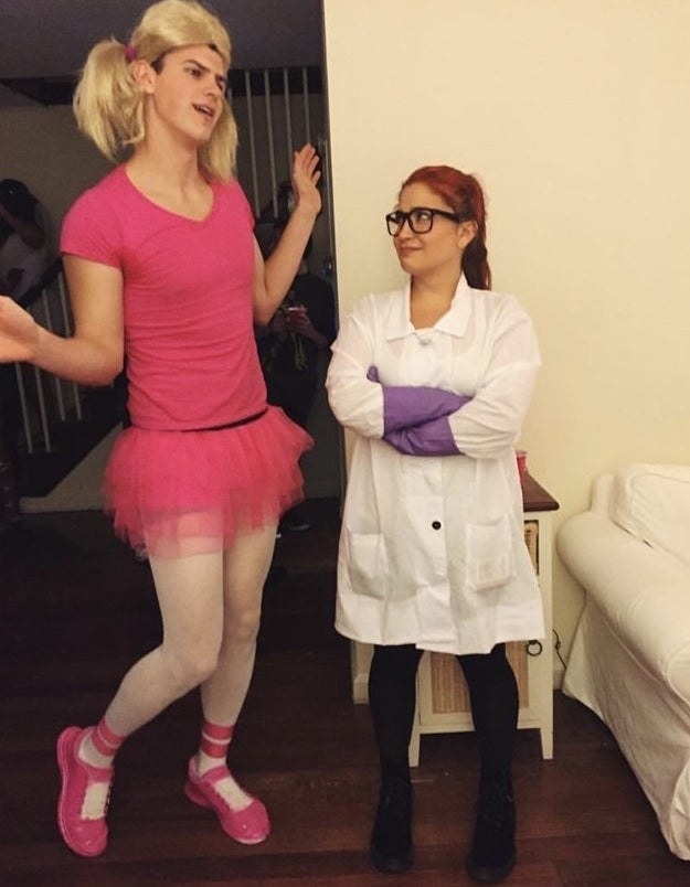 One person in a pink leotard and one person wearing a medical coat
