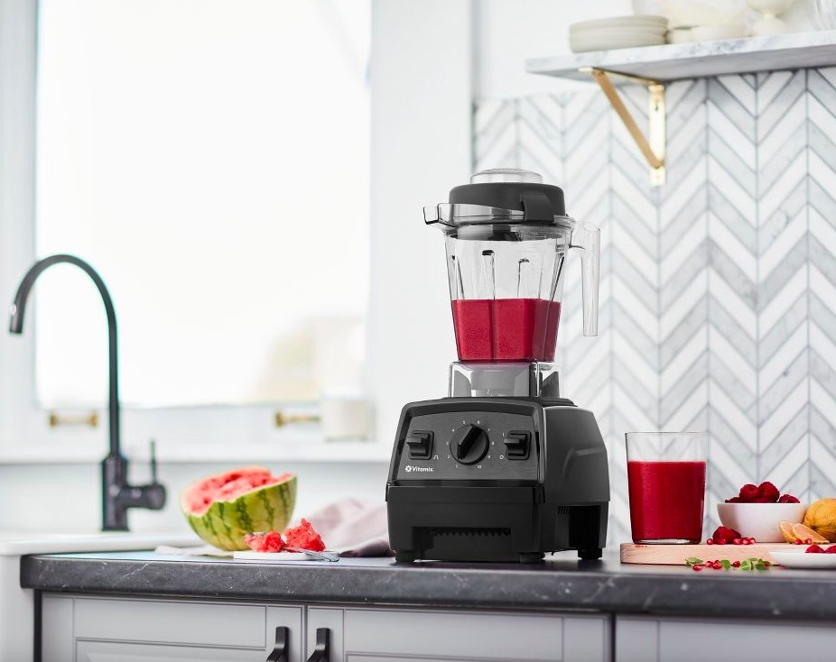 The Vitamix on a counter with smoothie ingredients