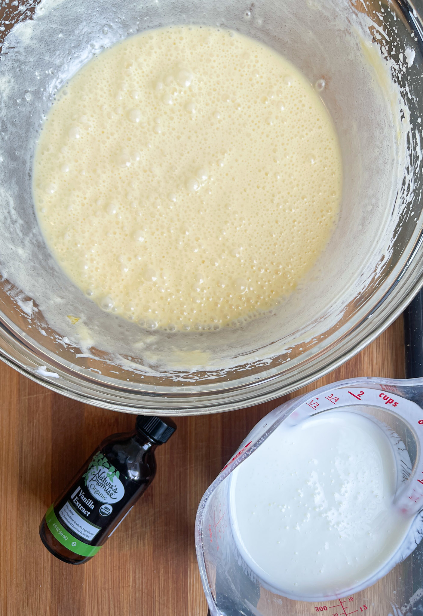 wet ingredients, vanilla bottle, buttermilk in a measuring cup