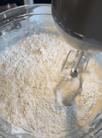 beating in flour into wet ingredients with a hand mixer