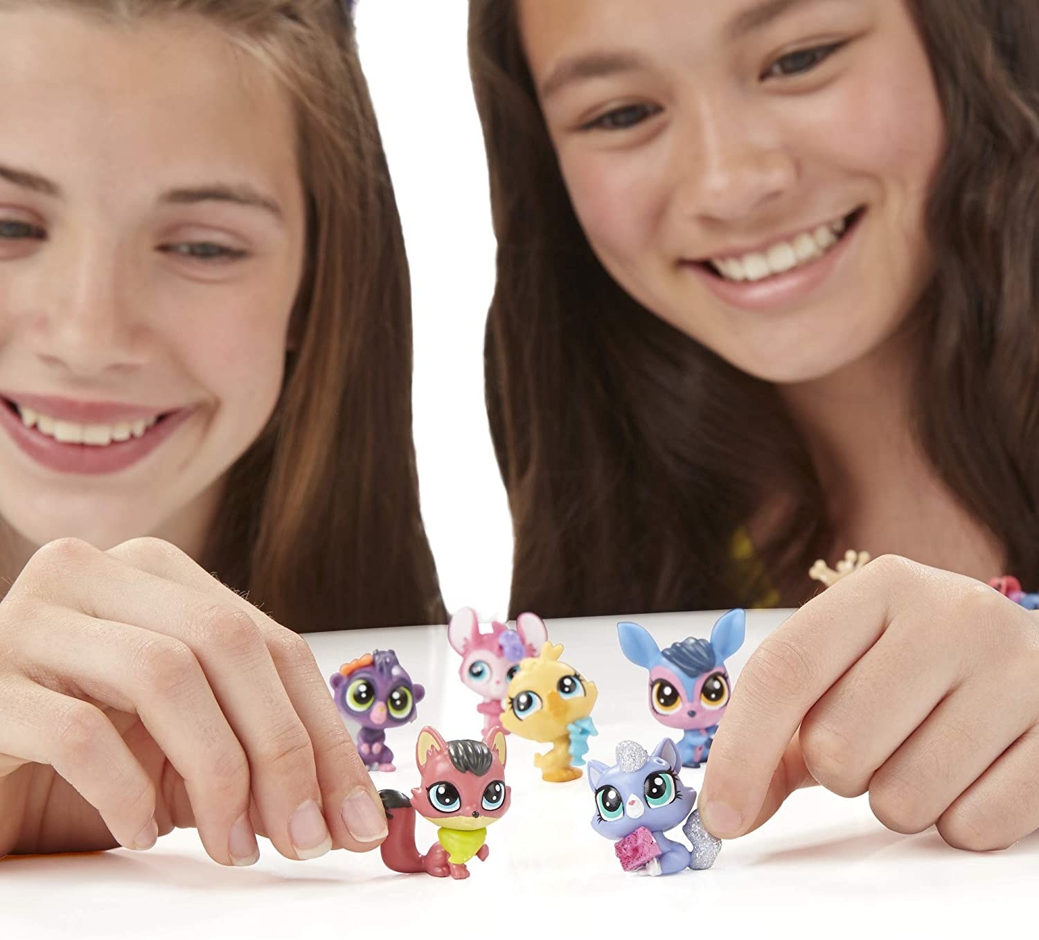 kids playing with the mini pet figures