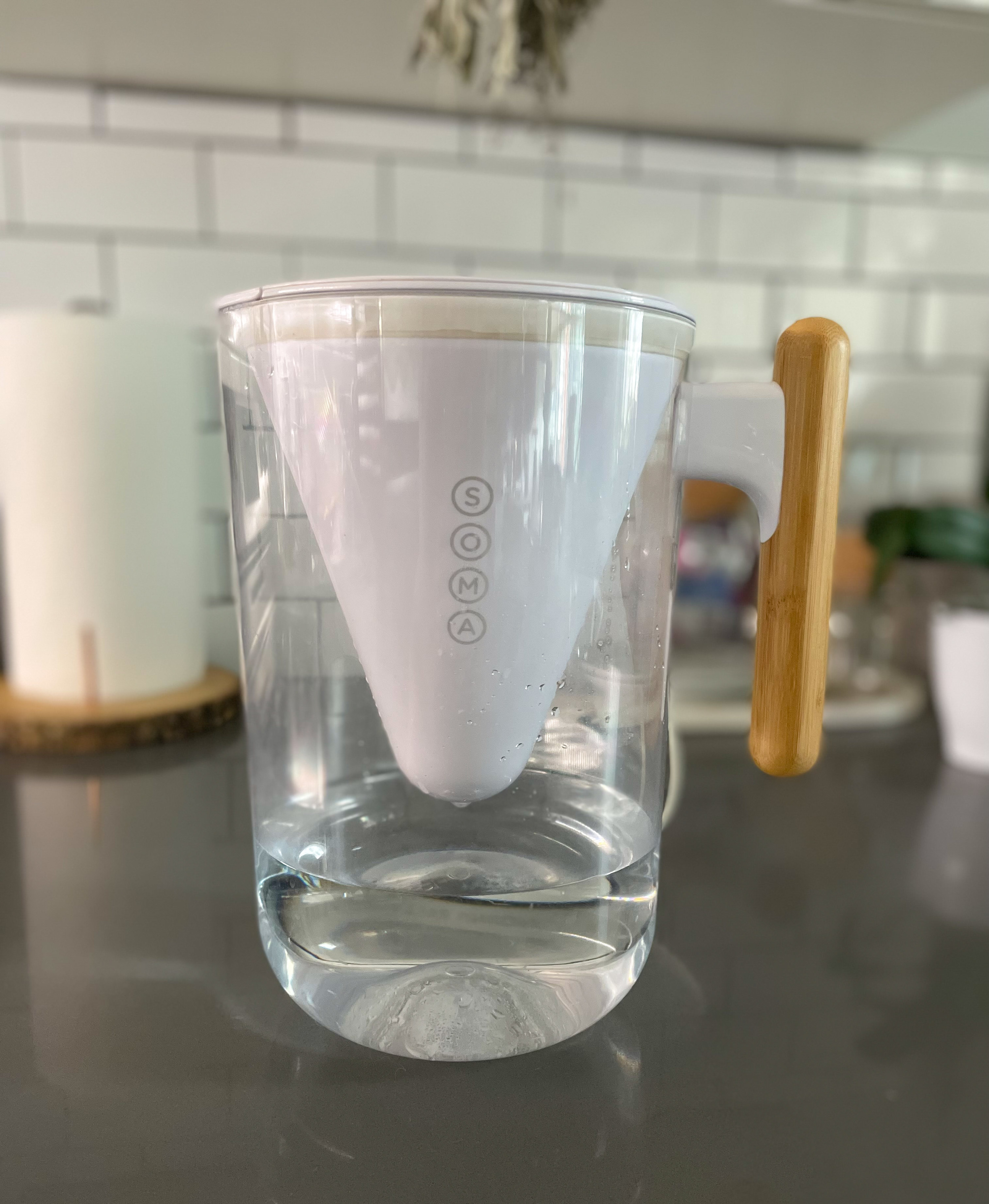 the soma water pitcher on a kitchen countertop