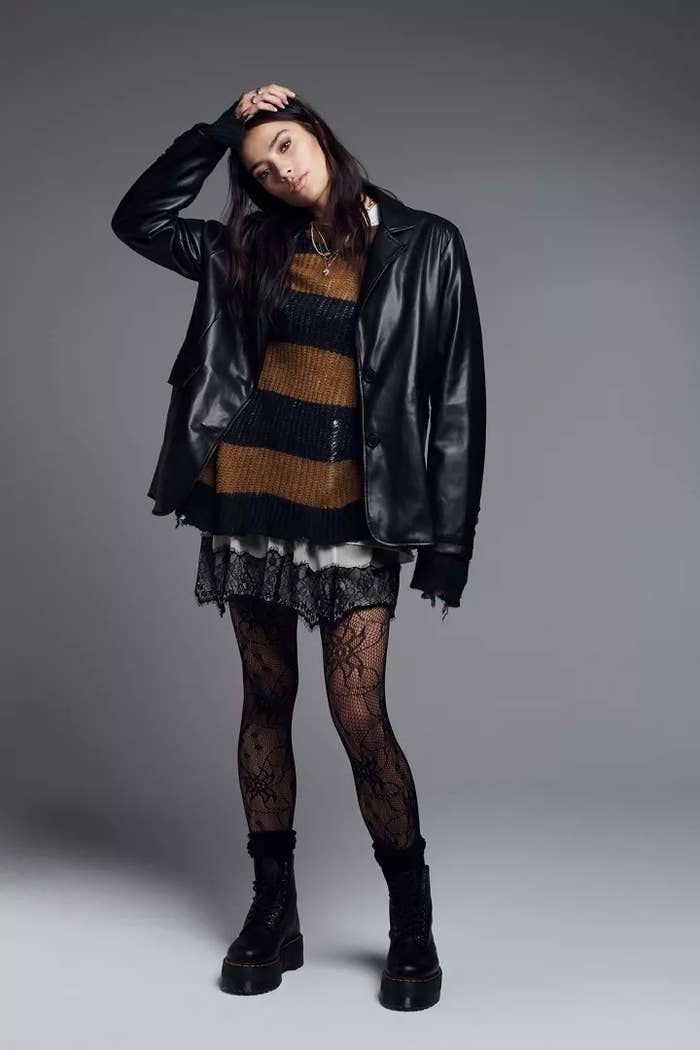 A model wearing the blazer in the color Black