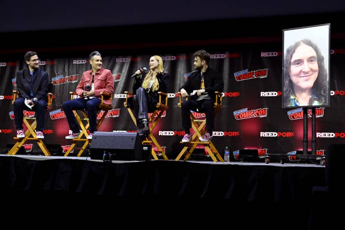 Evan and Daniel being interviewed on the New York Comic-Con stage with Al joining by video call