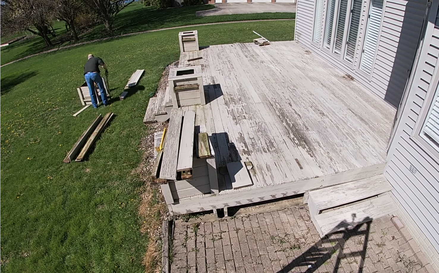 man rebuilding a deck