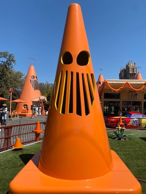 large traffic cones with spooky faces