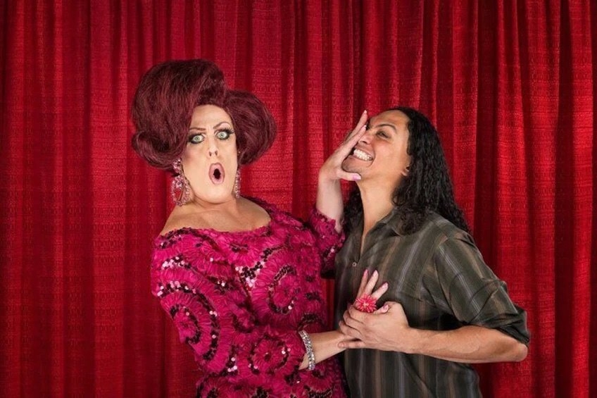 drag queen and bar patron
