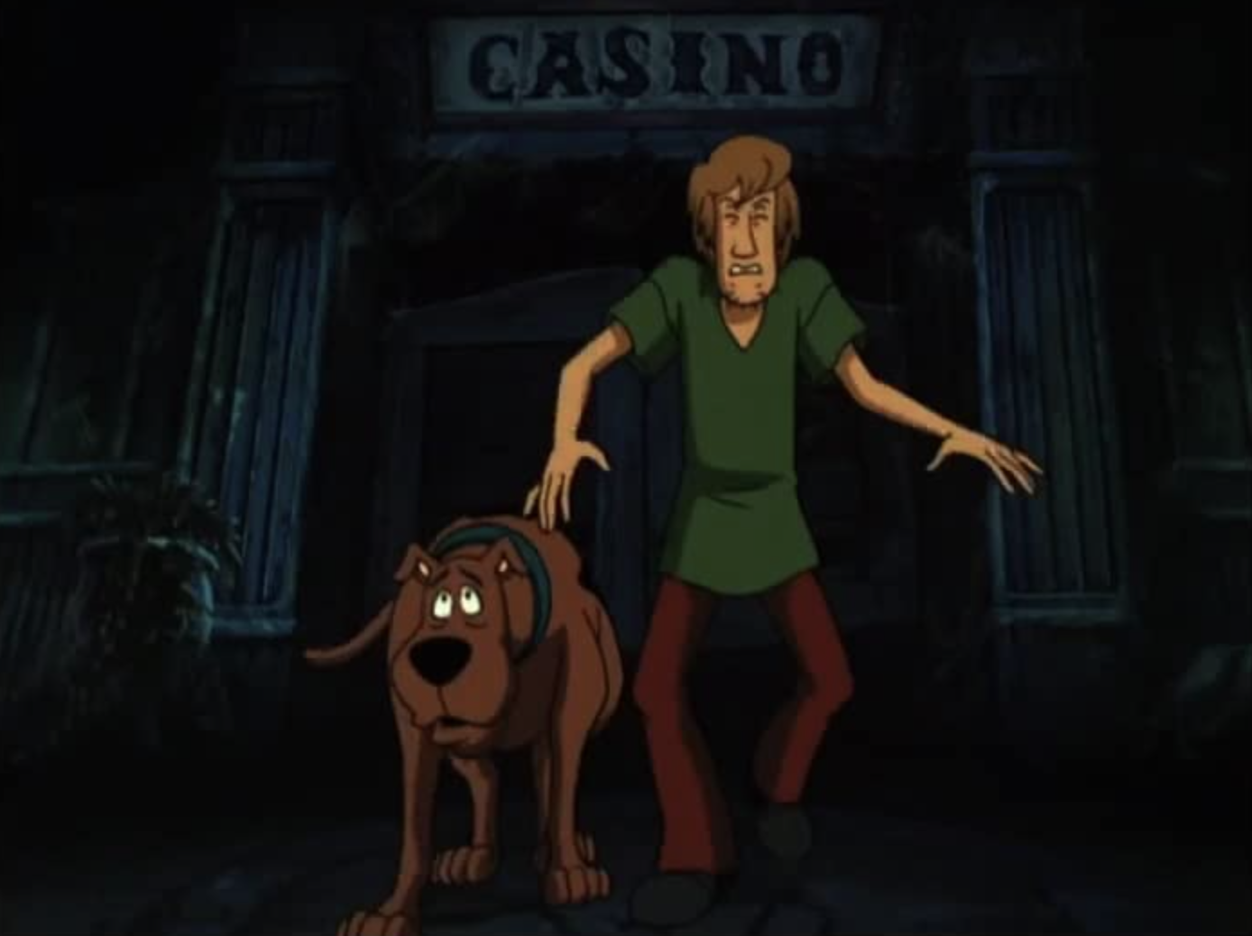 Shaggy and Scooby-Doo looking nervous while walking in the dark.