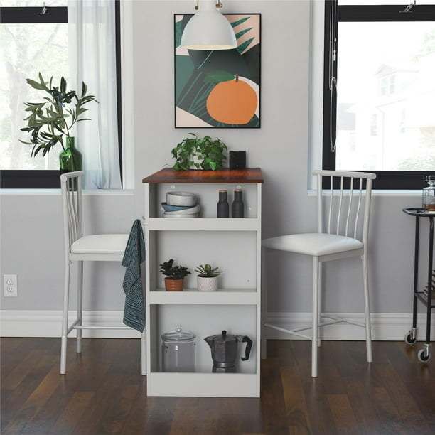 the white counter height dining table and two white chairs
