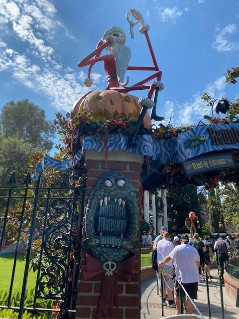 jack skeleton in a santa suit at the entrance