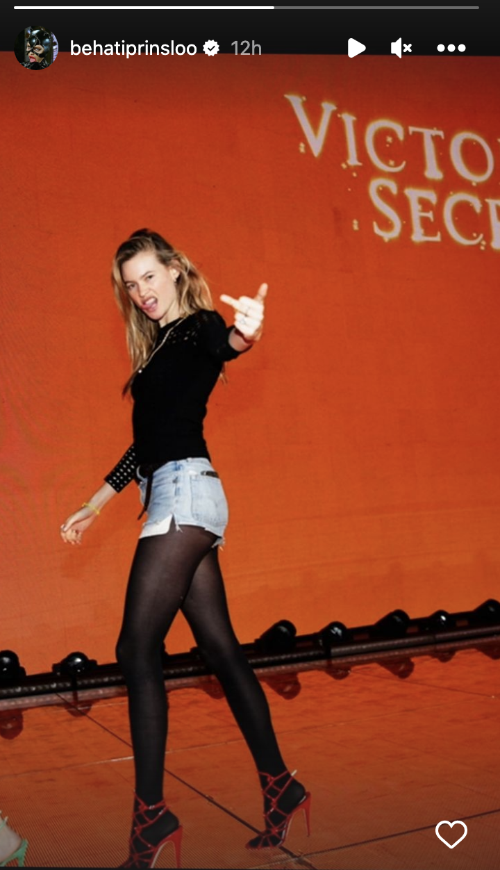 Behati flipping the camera off and sticking out her tongue as we walks away