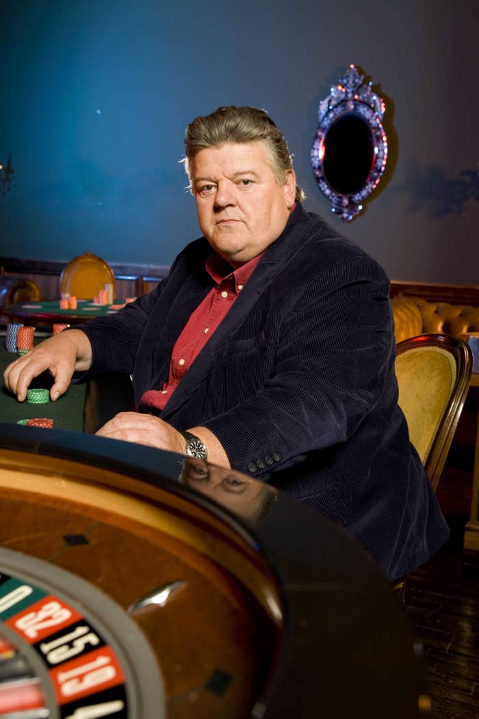Robbie sitting at a casino table