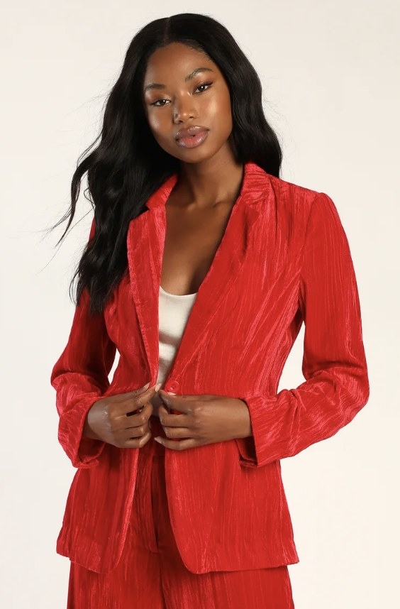 Th model wears the red option