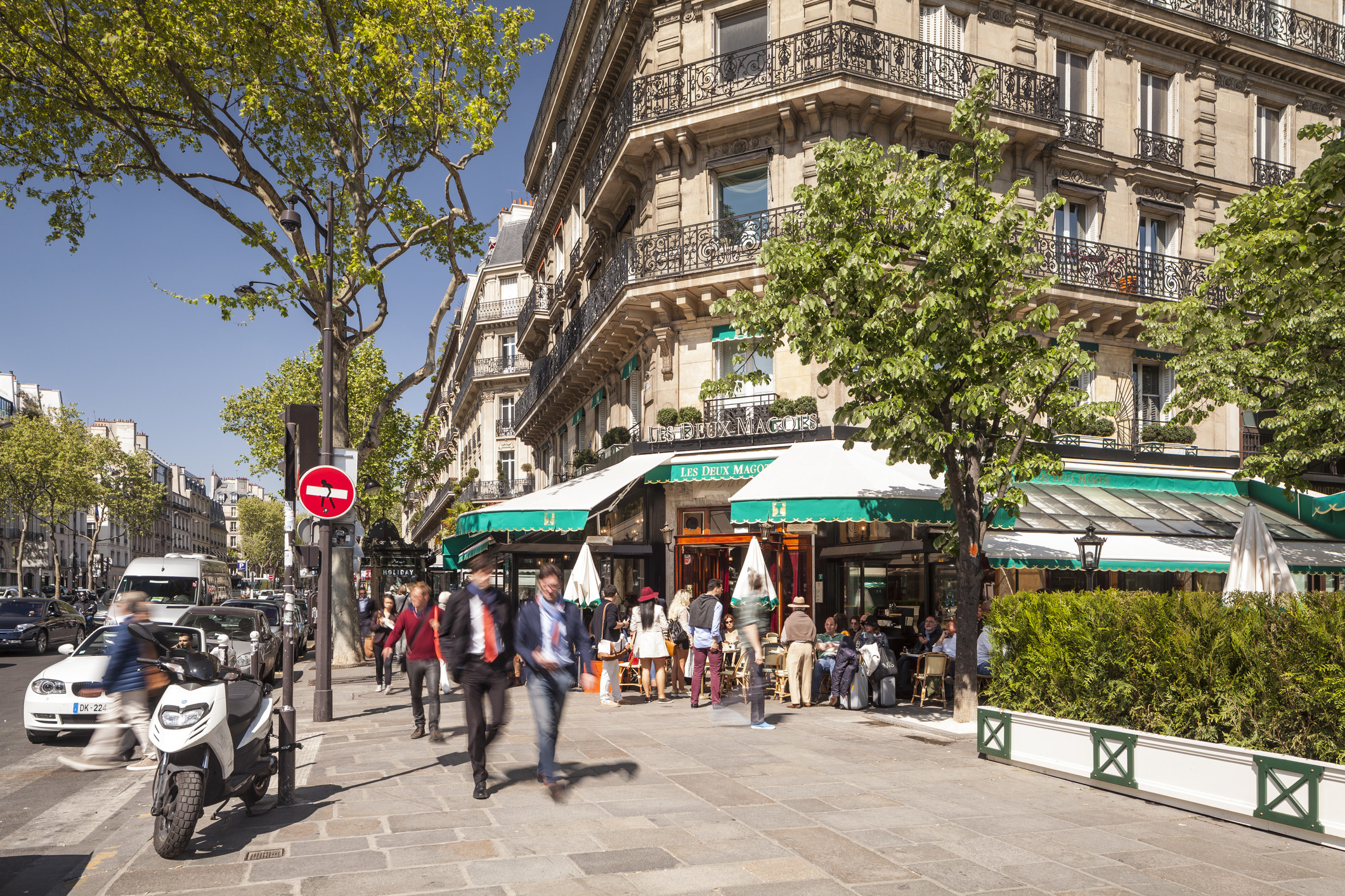 People walking in a Parisian neighborhood