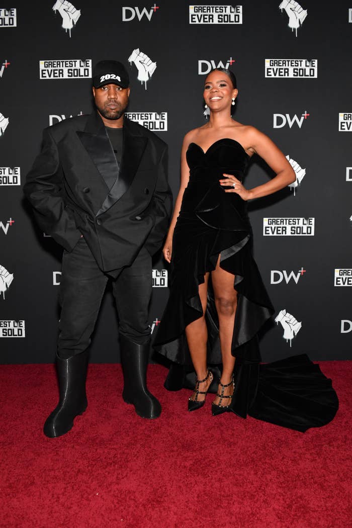 Kanye West and Candace Owens on a red carpet.