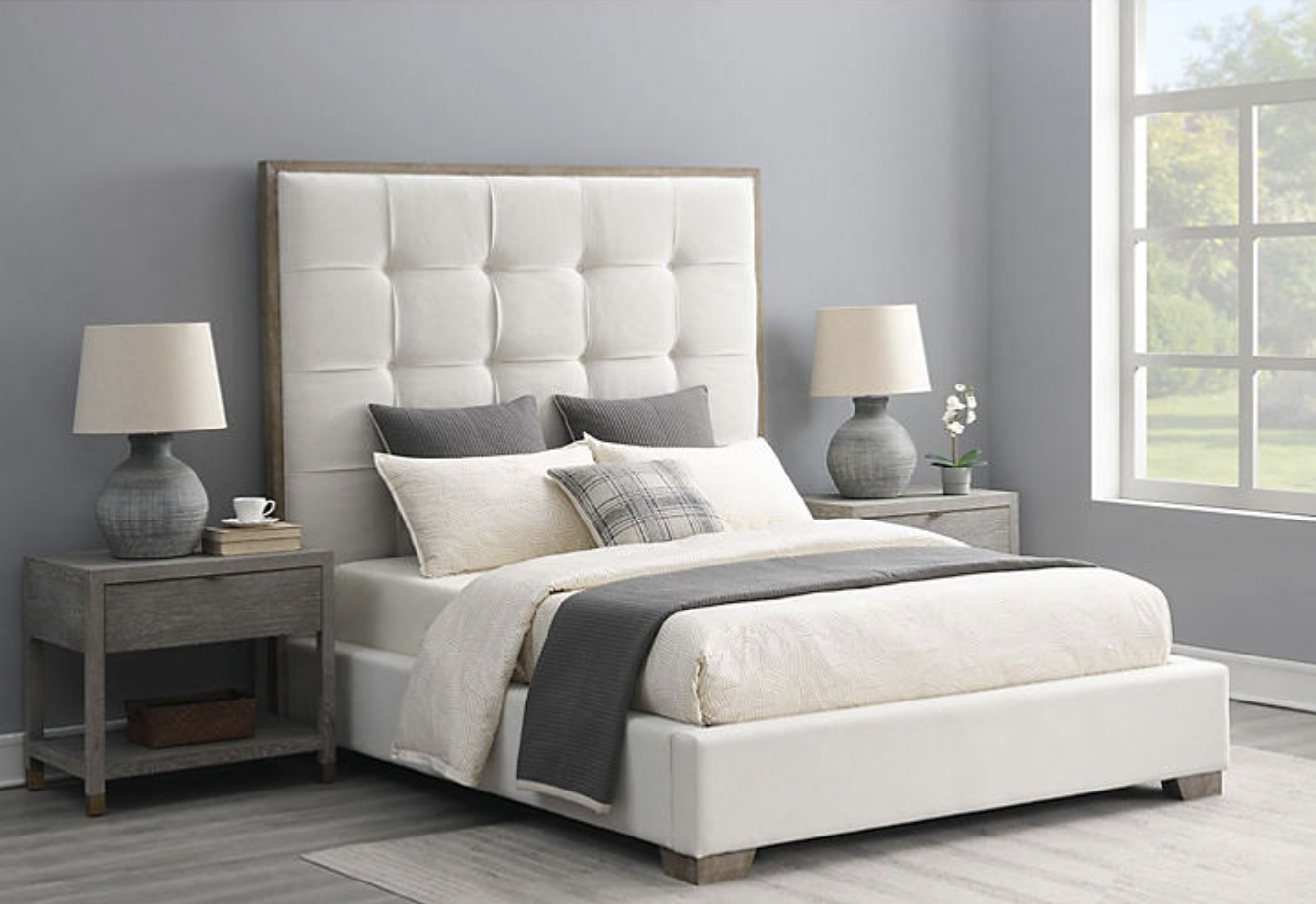 A square tufted headboard in a bedroom