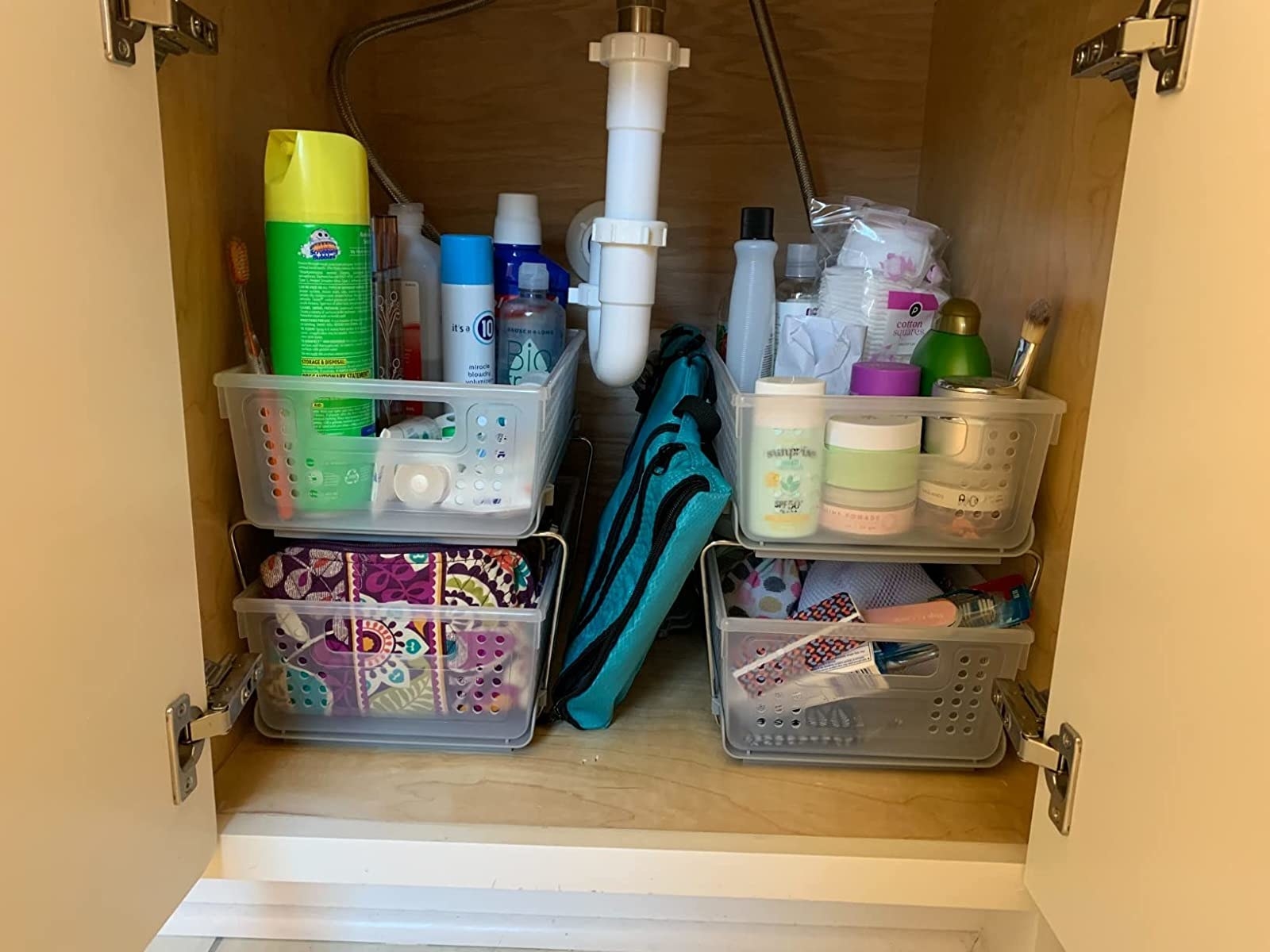 Under a reviewer&#x27;s kitchen sink organized with slide out baskets