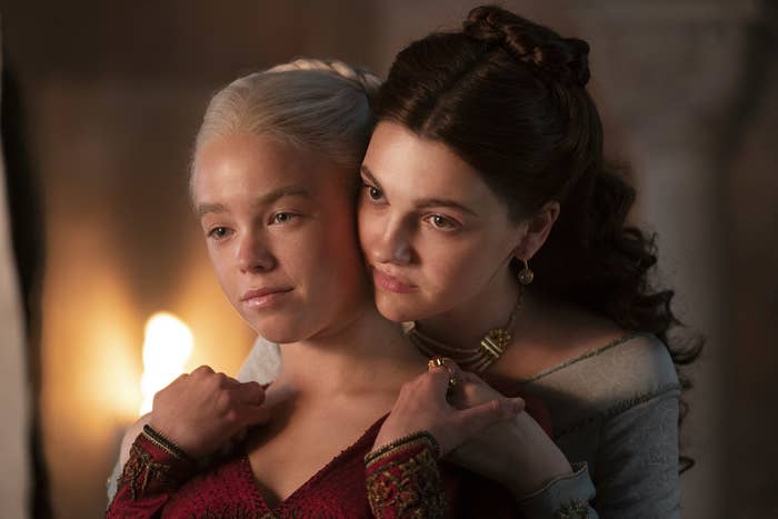 Young Rhaenyra and Alicent embracing