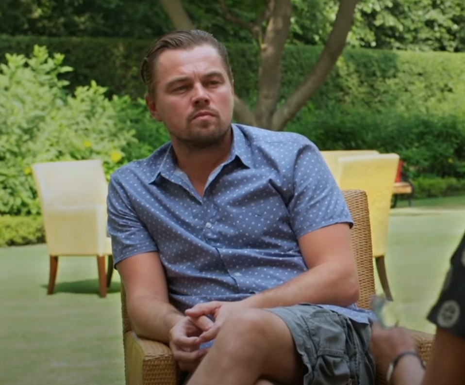 Leonardo DiCaprio talks with an expert about solar energy investments
