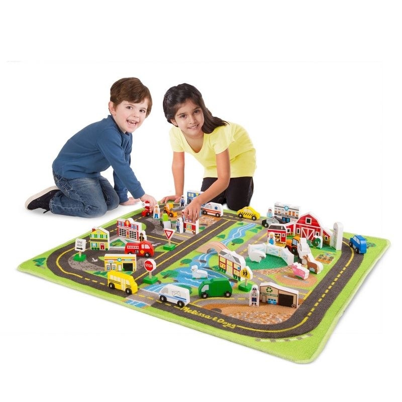 kids playing on rug with cars