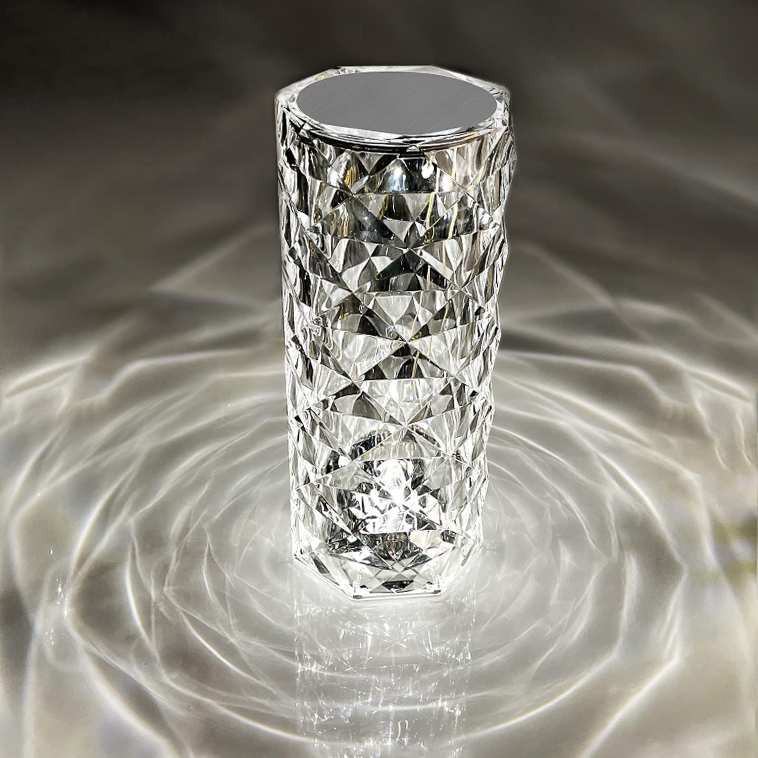 an acrylic tabletop light that gives off a diamond pattern when turned on