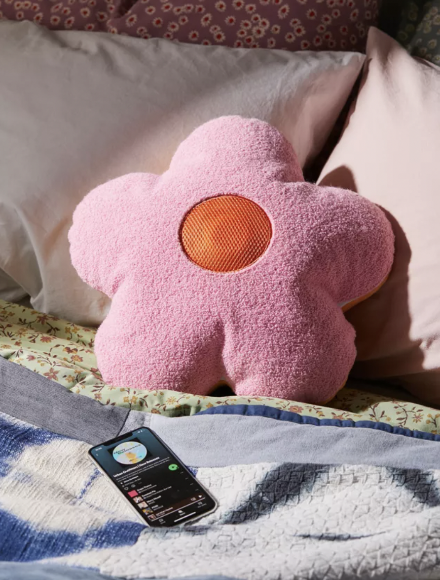a flower-shaped pillow with built-in bluetooth