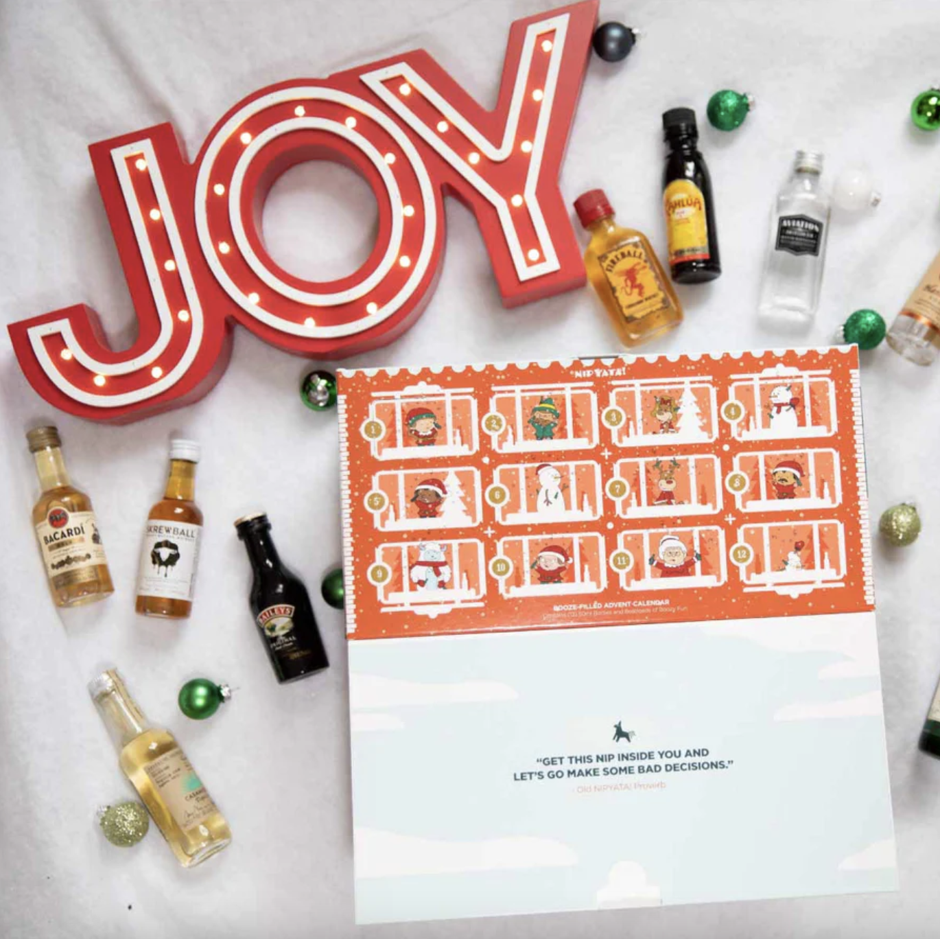 an advent calendar filled with tiny bottles of alcohol