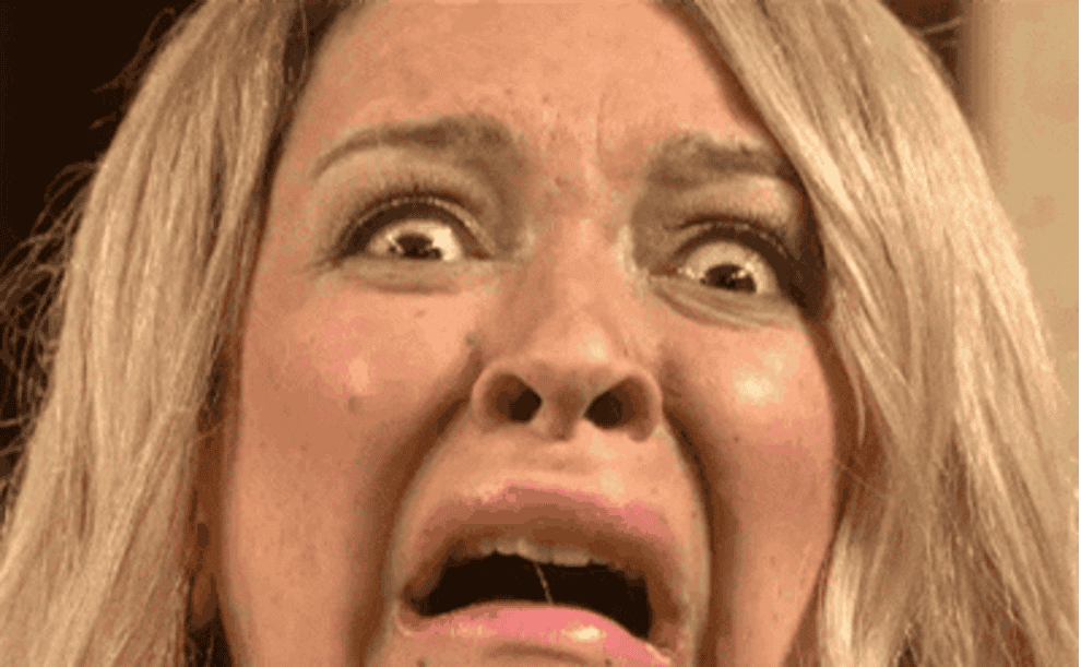 gif of actress from saturday night live with a scared face