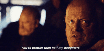 A bald man makes a condescending comment to a Night&#x27;s Watch officer