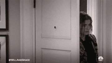 woman walking through the door drenched