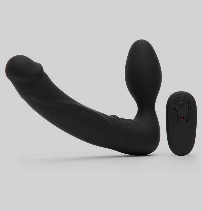 a double-sided strapless vibrator with its remote