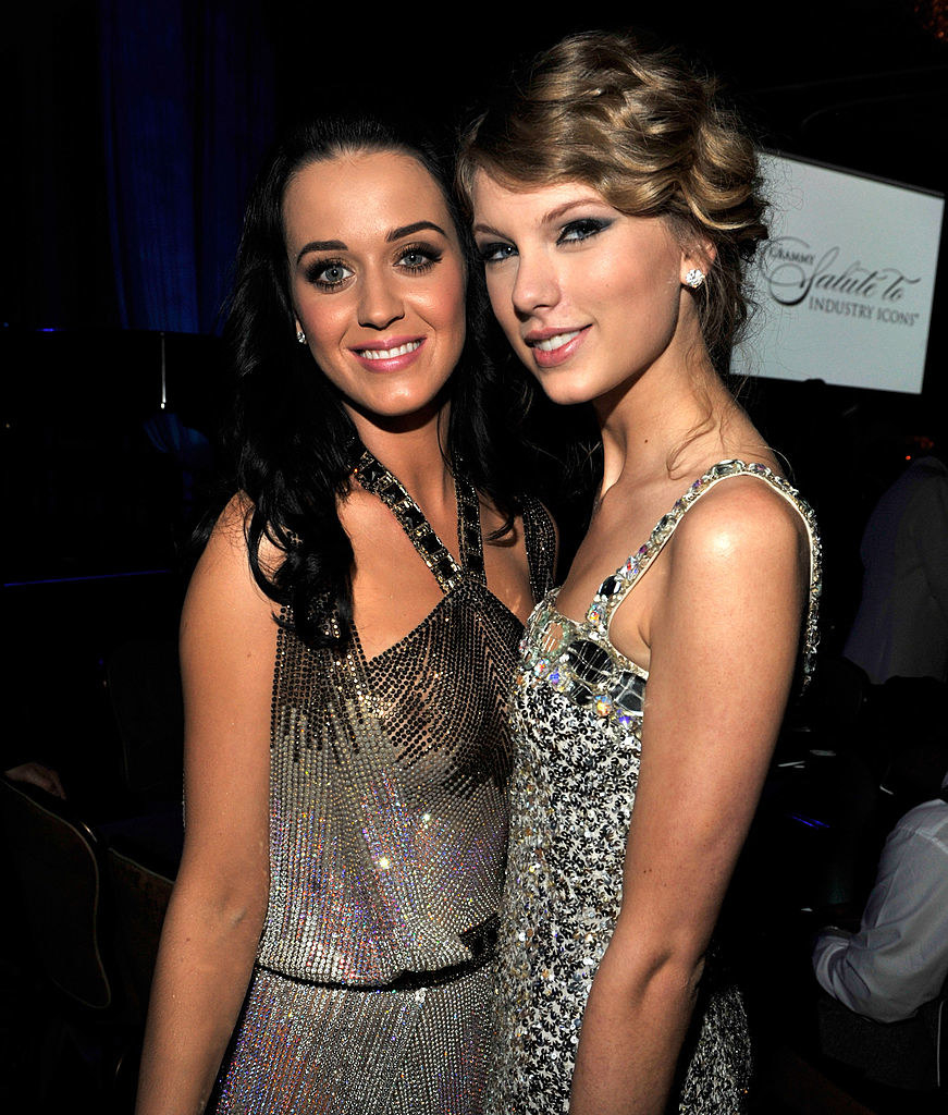 Katy Perry and Taylor Swift wear sleeveless sparkly dresses and stand close together