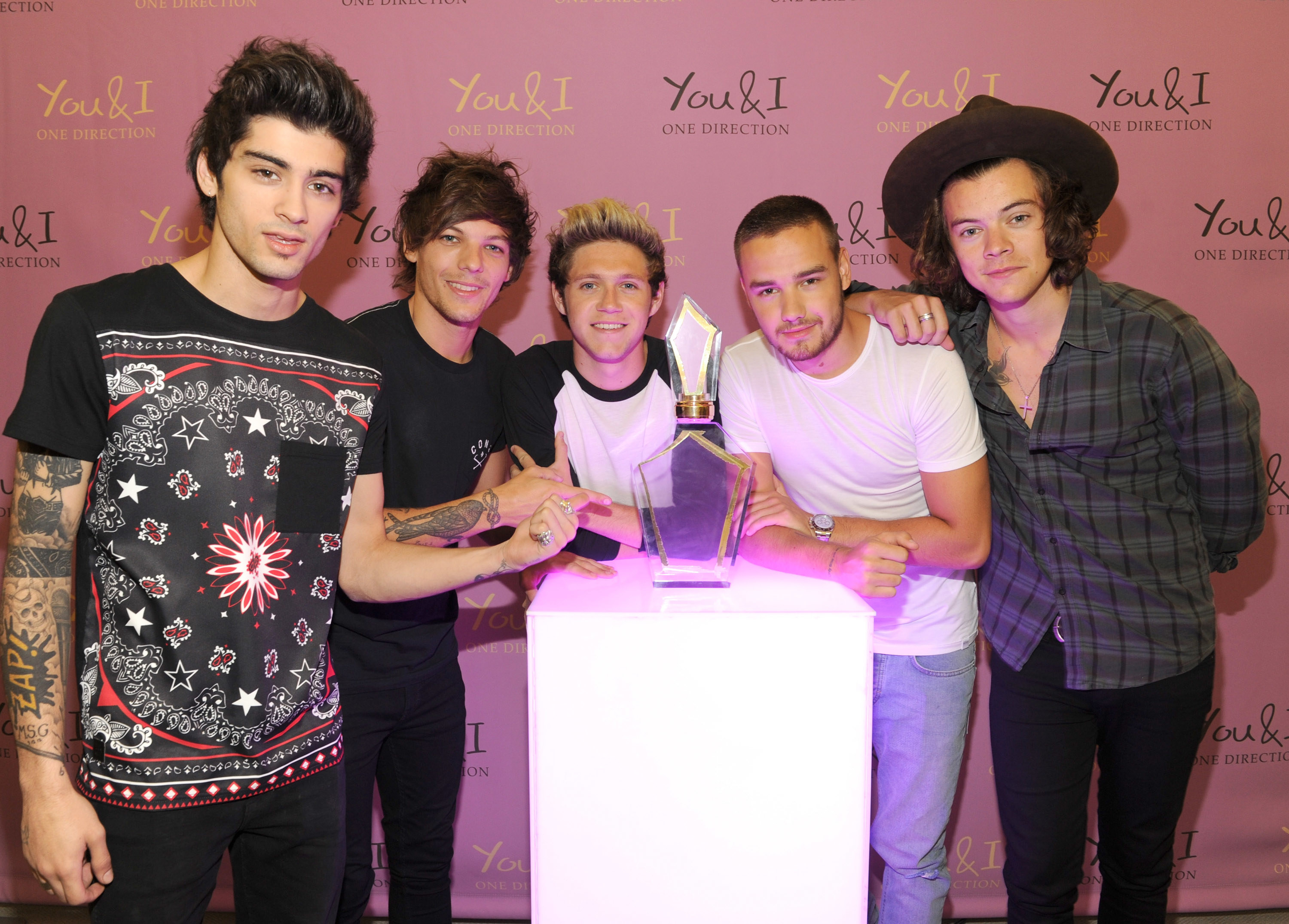 One Direction posing together for a photo at an event