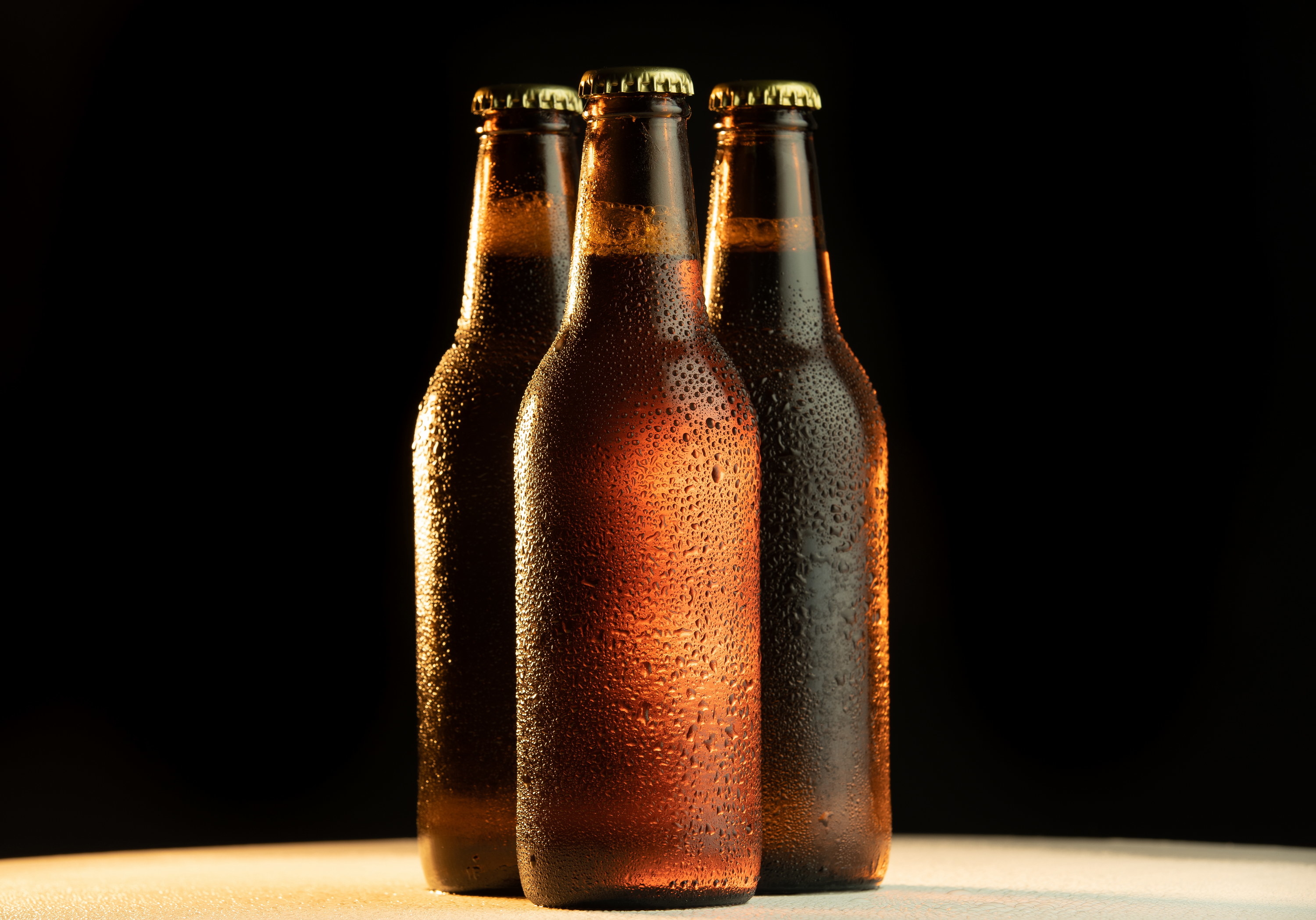 closeup of beer bottles
