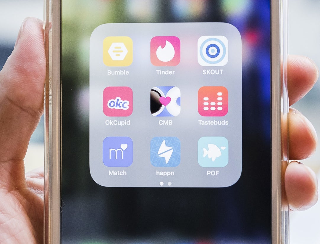 dating apps in a folder on a smartphone